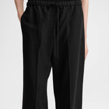 Fluid drawstring trousers black by Toteme