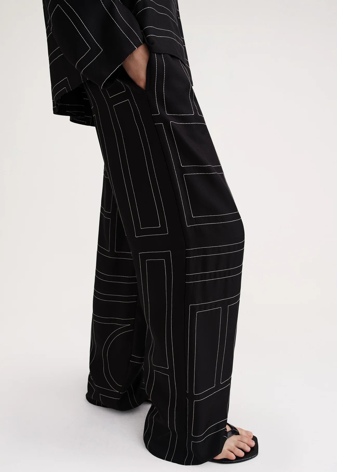 Monogram Silk Pajama Bottoms Black by Toteme – The Line