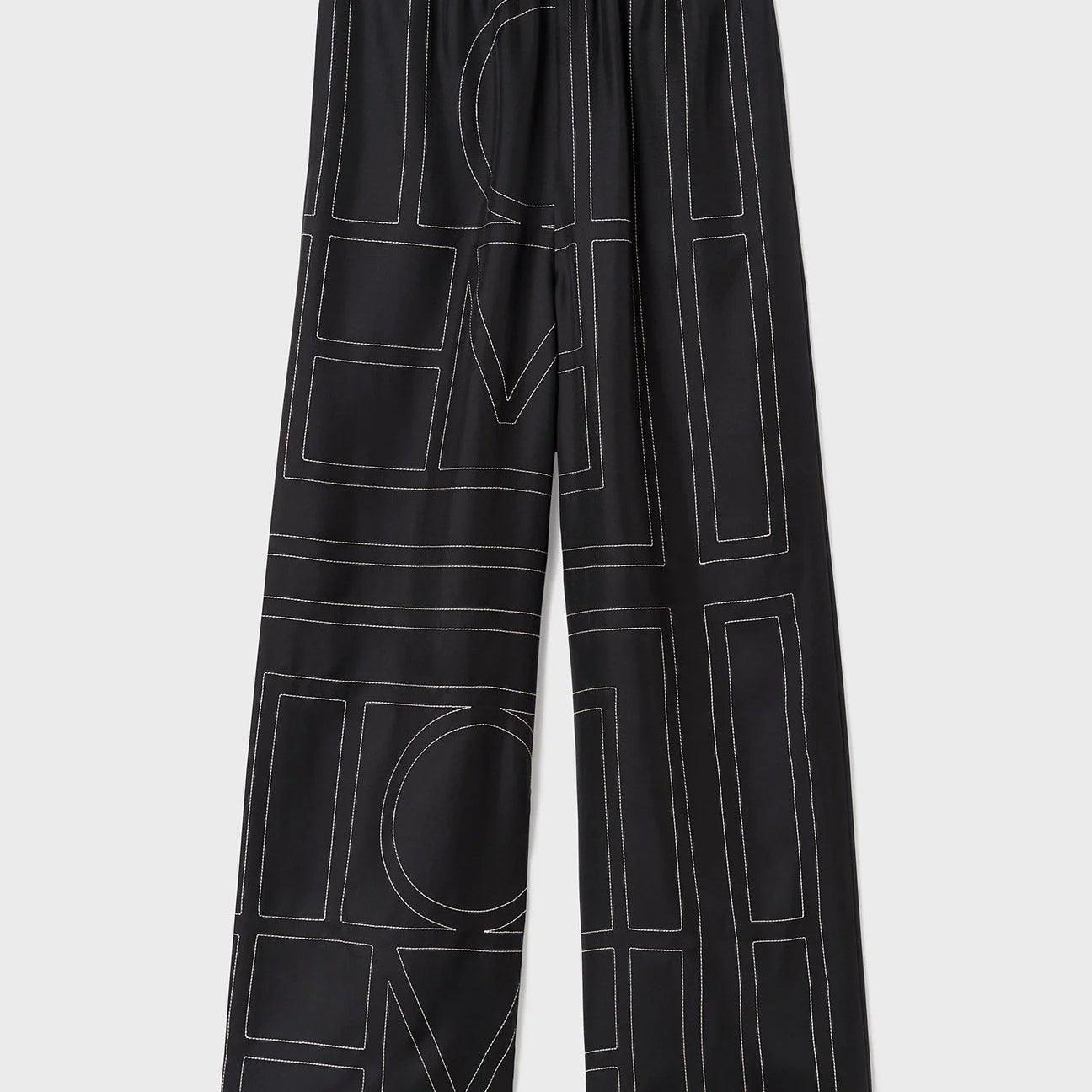 Monogram Silk Pajama Bottoms Black by Toteme - The Line