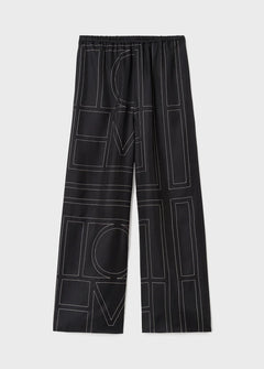 Monogram Silk Pajama Bottoms Black by Toteme - The Line